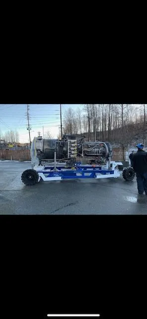 Finished white frame on mobile trailer unit outdoors in winter